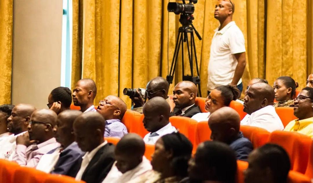 Attendees engaging during the launch event
